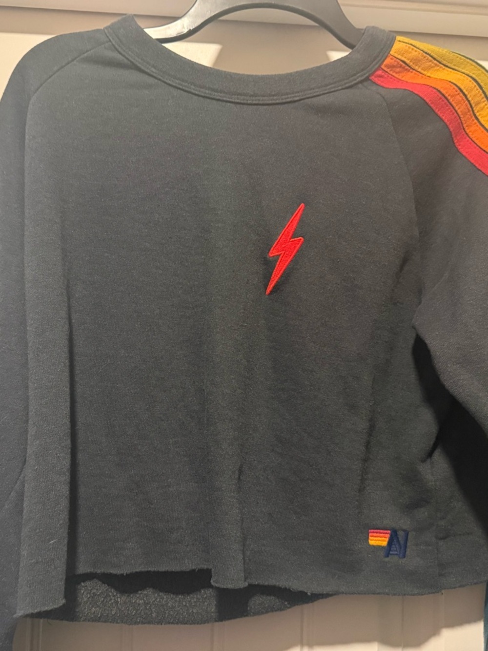 Aviator Nation Black Sweatshirt with Red Lightning and Rainbow Shoulder Stripes